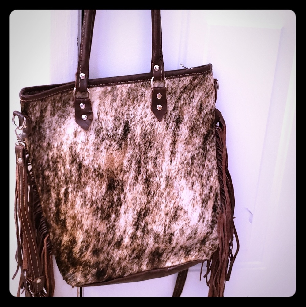 Authentic cow hair and leather fringe bag